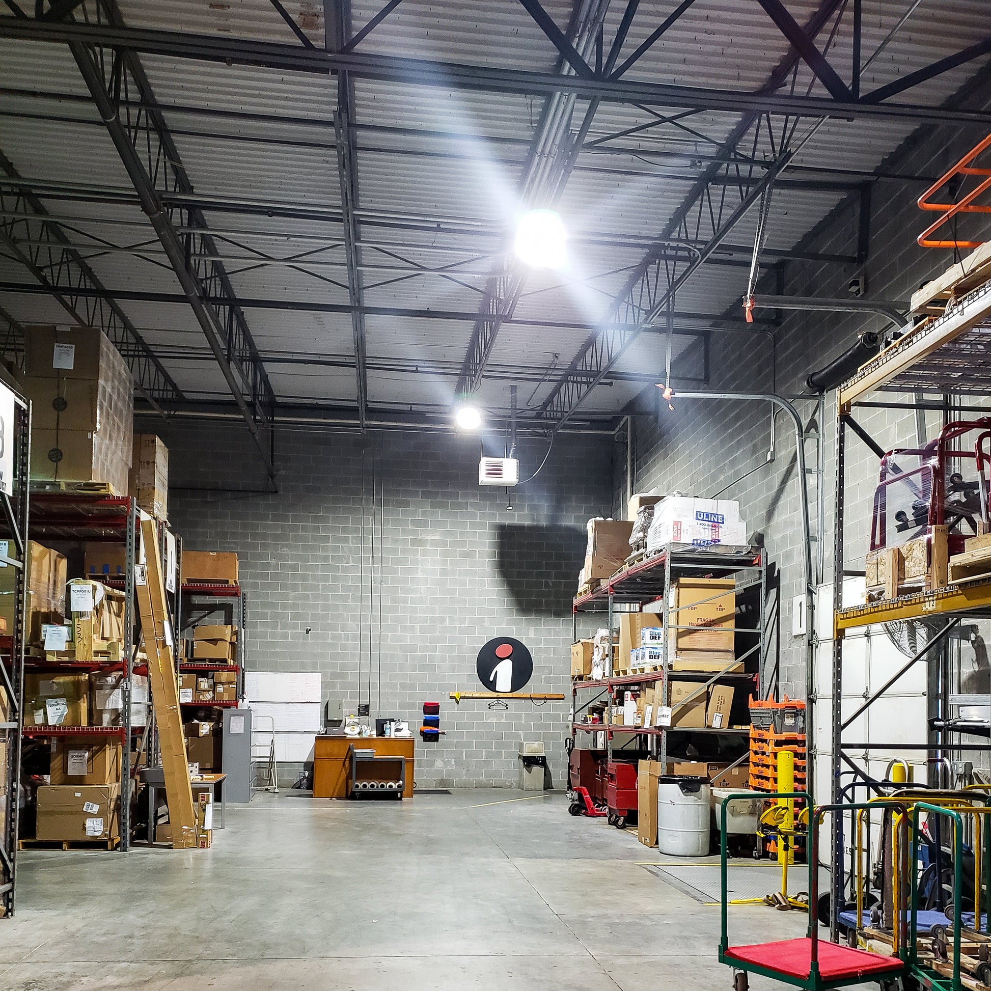 Commercial LED Lighting Fixture installed in a warehouse in Roswell, Georgia. LED High Bay, LED UFO installed.
